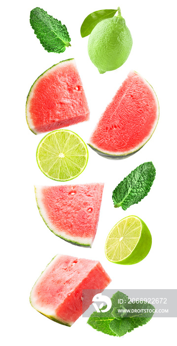 Falling watermelon with lime and mint isolated on white