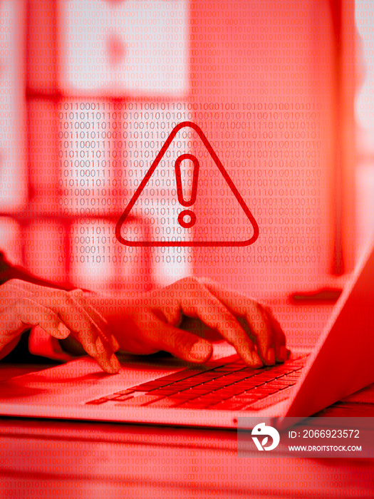 Virus alert. Red triangle, System hacked error sign, malware, attention danger symbol warning showing on binary code while business person working with laptop computer, red tone, vertical style.