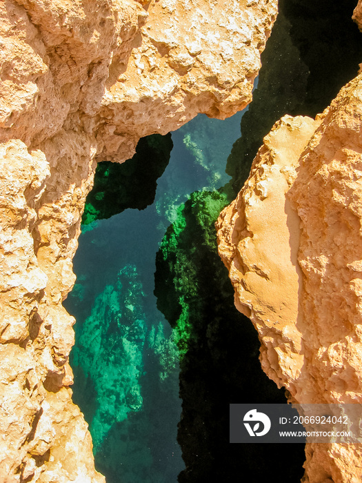 blue water break of Ras Mohammed National Park with its clear and transparent waters and its famous reef, Sharm el Sheik, Sinai Peninsula, Egypt. vertical view