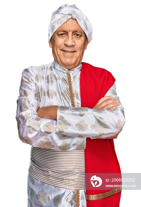 Senior hispanic man wearing tradition sherwani saree clothes happy face smiling with crossed arms looking at the camera. positive person.