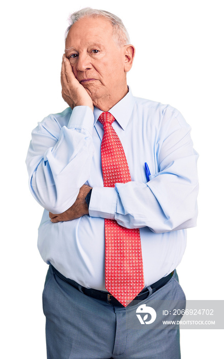 Senior handsome grey-haired man wearing elegant tie and shirt thinking looking tired and bored with depression problems with crossed arms.