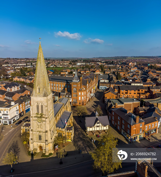 A panorama aerial view of the central square in the town of Market Harborough, UK in springtime