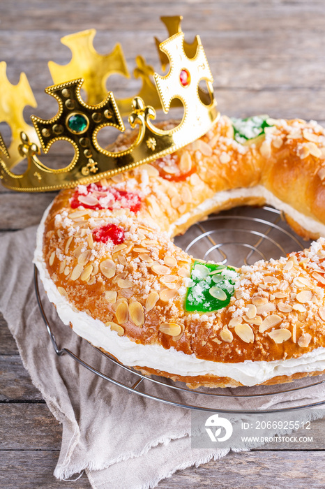 Traditional Spanish Epiphany cake, Roscon de Reyes with festive decorations