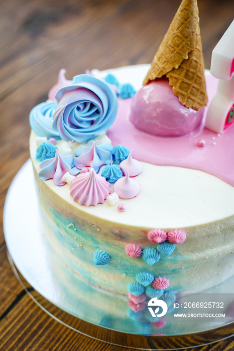 Delicious birthday or wedding cake on wooden background