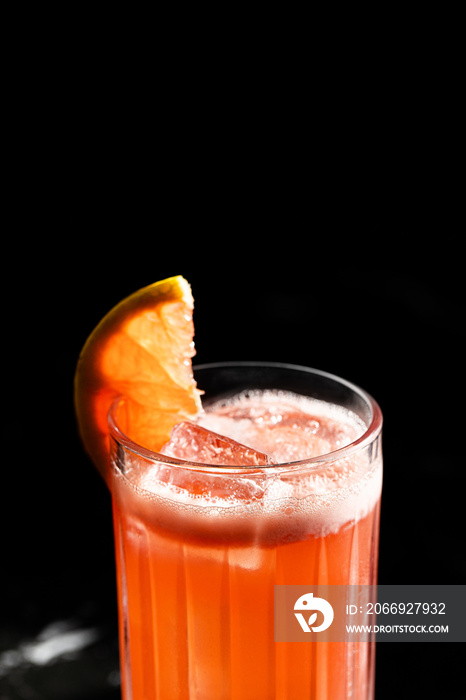 close up picture of grapefruit garibaldi cocktail in a highball glass