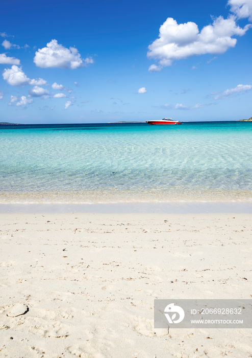 Boat on the beautiful sea of the Ira beach in Porto Rotondo, Olbia, Costa Smeralda - Sardinia