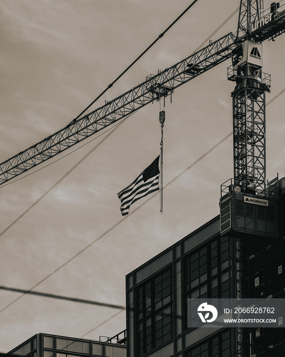 construction crane and American flag
