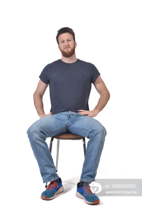 full portrait of a man sitting on a chair on white