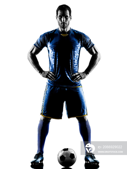 one caucasian soccer player man standing in silhouette isolated on white background