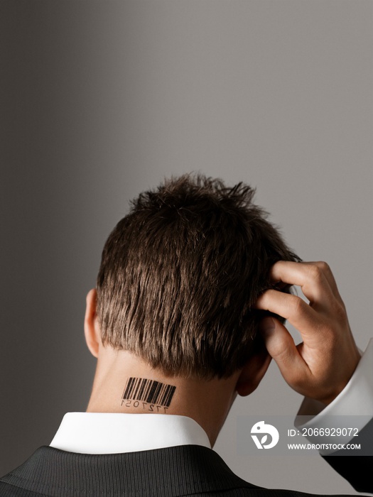 Businessman With Barcode Tattoo On Neck Scratching His Head