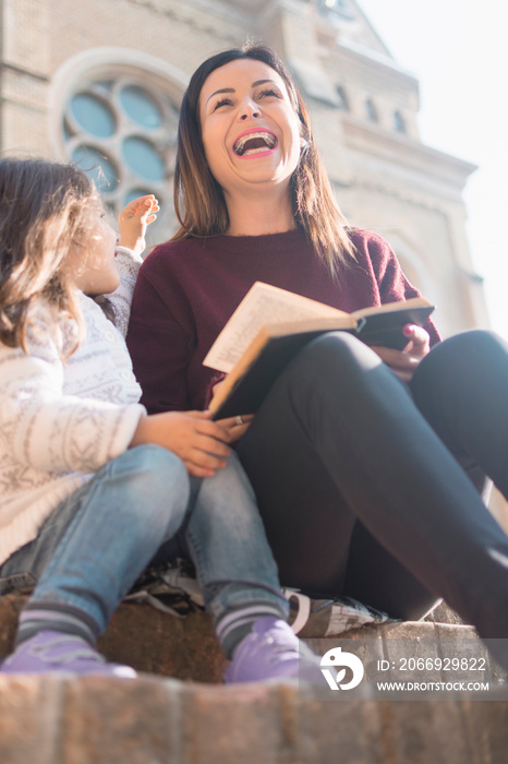 My daughter adores when I read stories in front of the church on Sunday