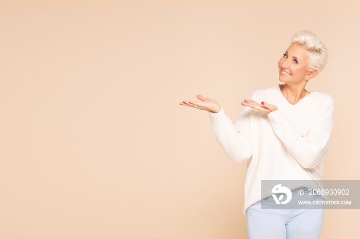 Smiling adult lady in cozy sweater.