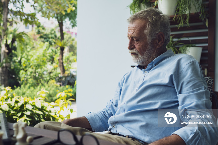 senior man thinking about business strategy as serious and stress at balcony