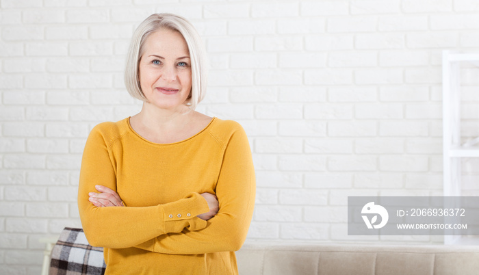 Portrait of beautiful senior woman at home.