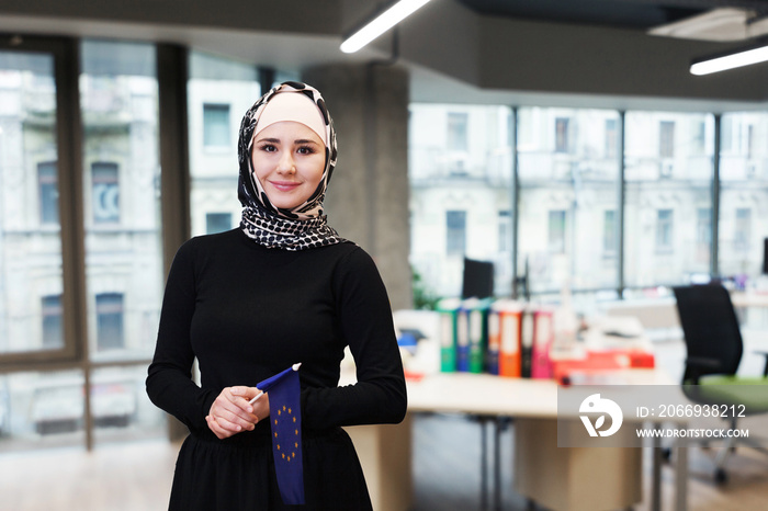 Muslim asian woman with the european flag.