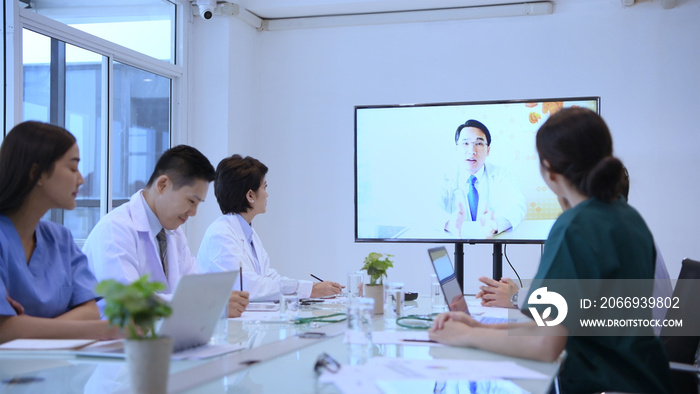 Medical concept. The medical team is communicating with the video call. Within the meeting room of the hospital. 4k Resolution.