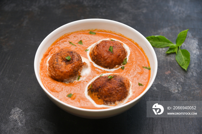 Malai Kofta Curry Mughlai or Haryanvi style Methi  in white cream, popular indian vegetarian main course served with Chapati Or Roti. Cheese ball dipped in creamy gravy Classic North Indian side dish