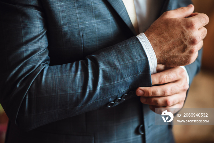 Closeup grooms wedding suit