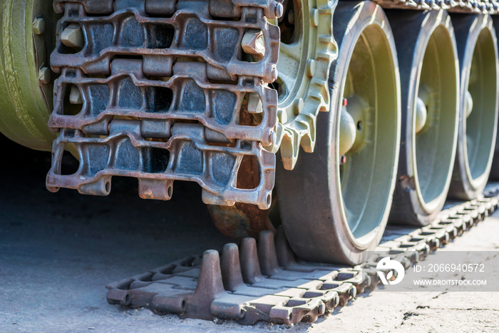 Broken tank caterpillar. Details of a military tank. Tank tracks