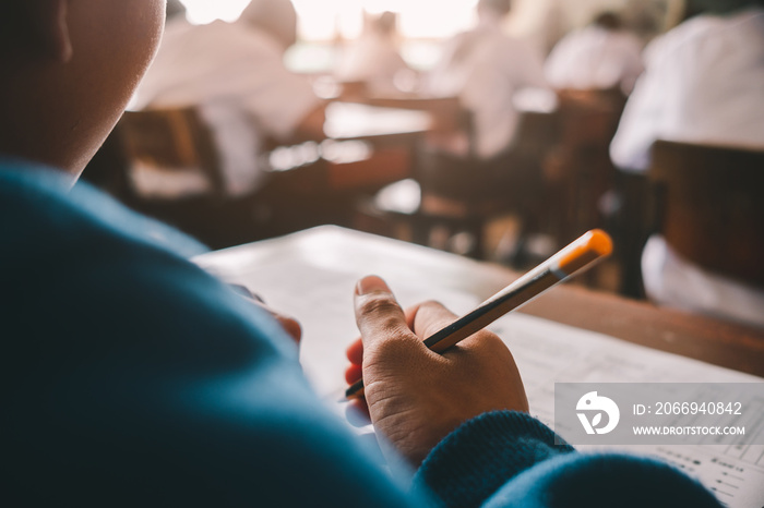 Student reading and taking exam with stress