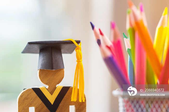 Back to School Concept, People Sign wood with Graduation celebrating cap blur pencil box, show alternative studying. Graduate or Education knowledge learning study abroad international Ideas.