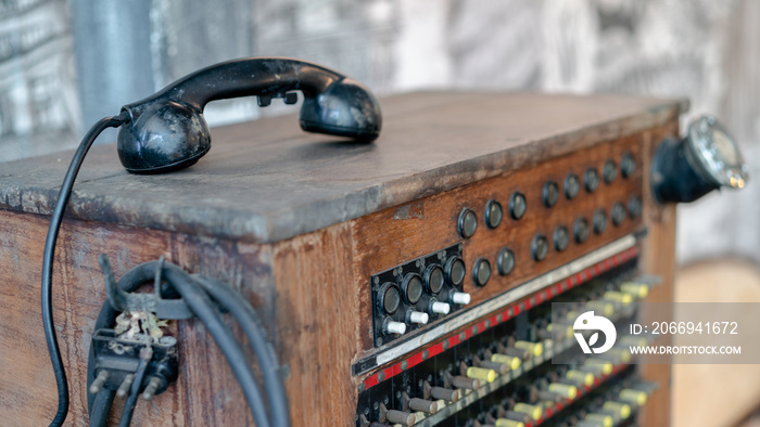 Historical, telecommunications system. Old vintage telephone switchboard.