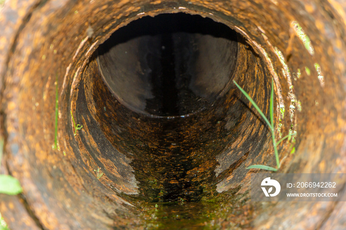 Old rusted steel pipes that have been used for a long time