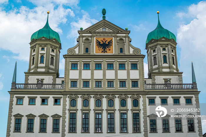 New Detail of the upper facade of the Augsburg City Hall and the shield of the city. Photography taken in Augsburg, Bavaria Germany.