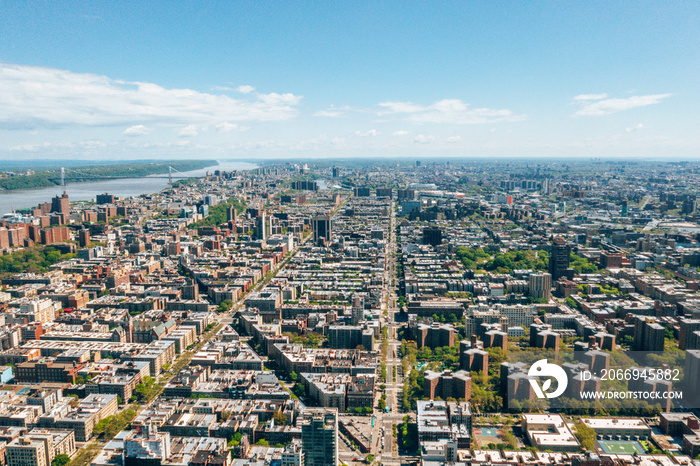 Aerial detailed view of the Manhattan uptown, New York. Upper Manhattan and Harlem district.