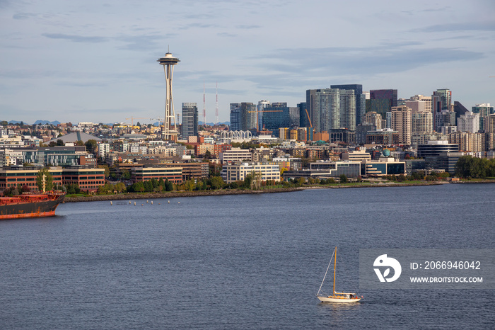 Downtown Seattle, Washington, United States of America. Aerial View of the Modern City on the Pacific Ocean Coast during a sunny and cloudy Autumn Day.