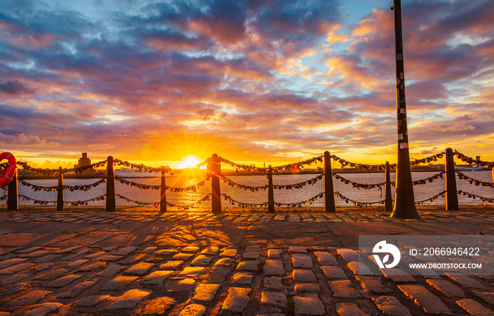 Walkway between the Royal Albert Dock and the Waterfront in Liverpool, United Kingdom during sunset