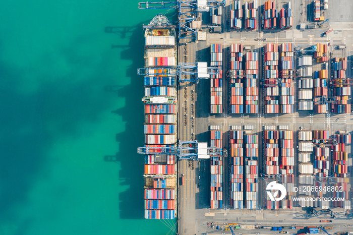 Aerial top view of Cargo operations on container ship in trade port. Business logistic commercial intermodal freight transport in import export, Cargo ship of international at seaports in the World.4k