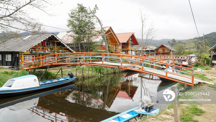 Laguna de la Cocha at El Encano with wooden briges and stilt houses near Pasto, Colombia.