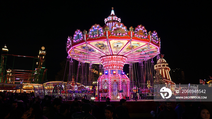 Winter Wonderland funfair amusement park and Christmas market in Hyde Park, London.