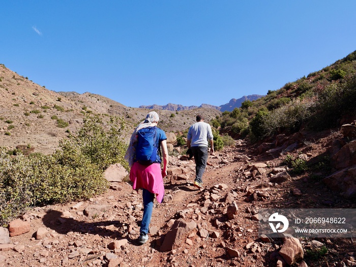 Hikers trekking in Ourika Valley, High Atlas Mountains, Morocco.