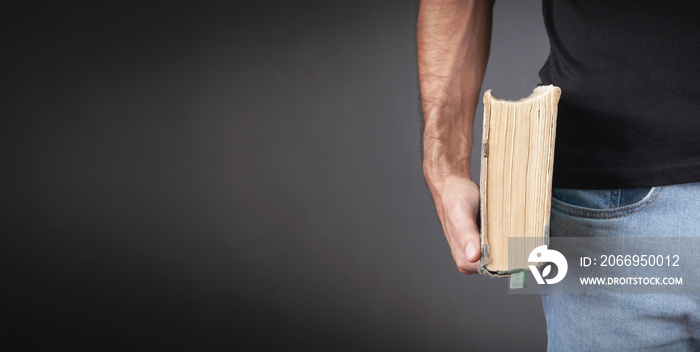 Caucasian man holding bible. Religion