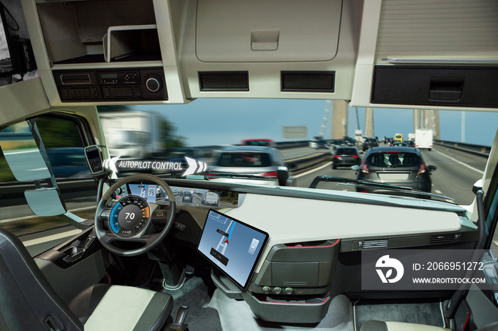 Self driving truck with head up display on a road. Inside view.