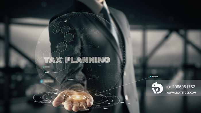 Tax Planning with hologram businessman concept