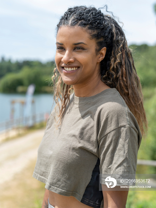 Portrait of smiling woman looking at view