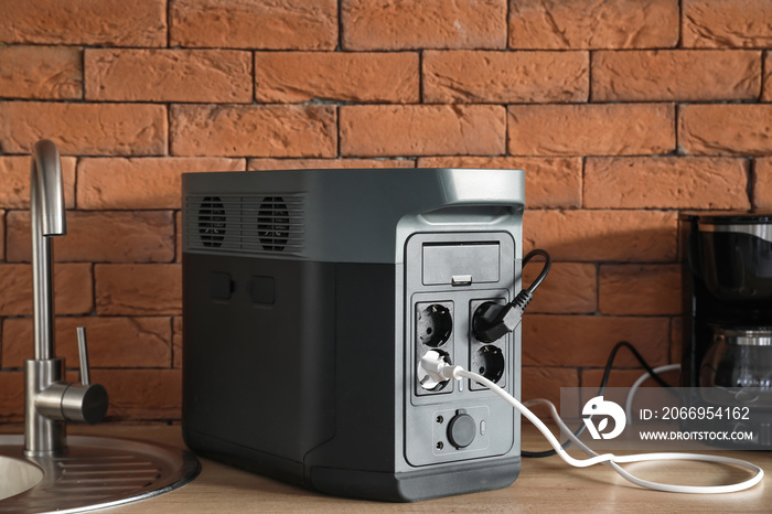 Portable power station on counter in kitchen