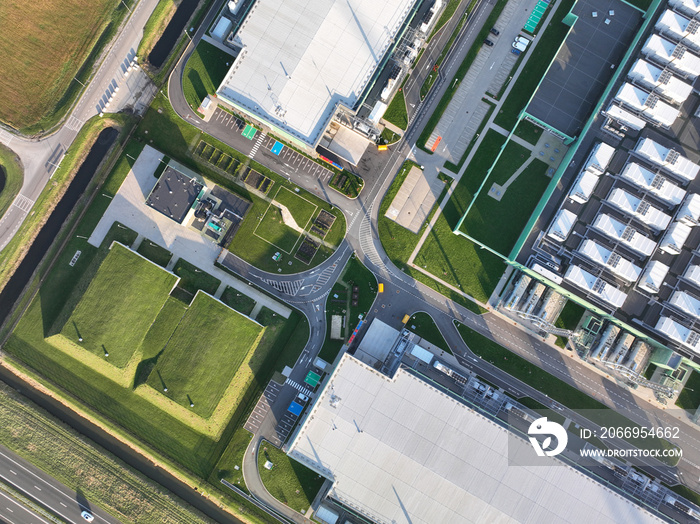 An aerial drone photo captures the impressive scale and advanced technology of a datacenter facility, showcasing its crucial role in maintaining and securing critical data and IT infrastructure.