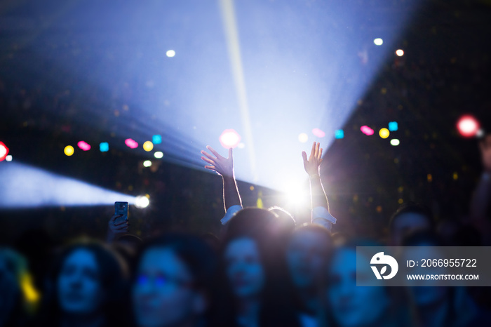 crowd having fun at concert - blurred image