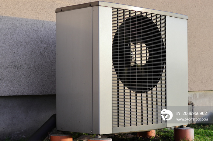 Outdoor unit air-water heat pump...Fan grille. Heating of a family house.