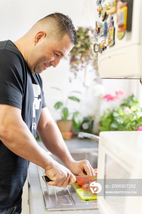 Man preparing food in kitchen