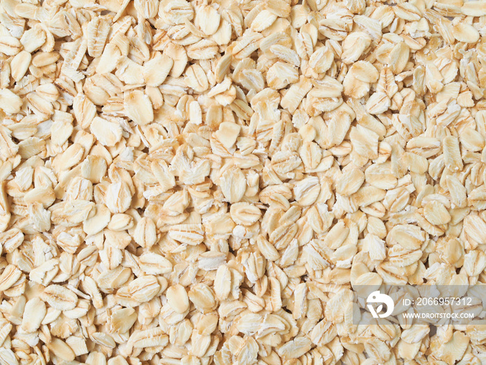 Top view of dried oatmeal, rolled oats with dry grain wallpaper.