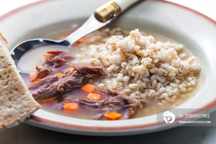 beef broth with carrot and barley groats