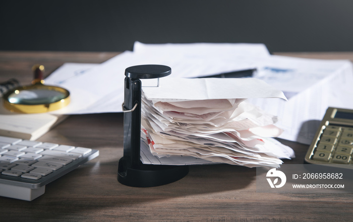 Stack of unpaid financial bills on the desk. Business. Finance