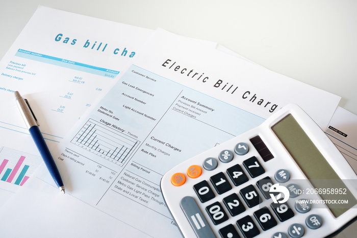 Energy efficiency concept with charges invoice documents on desk