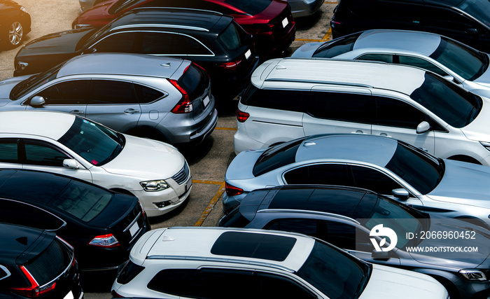 Car parked at parking lot of the airport for rental. Aerial view of car parking lot of the airport. Used luxury car for sale and rental service. Automobile parking space. Car dealership concept.