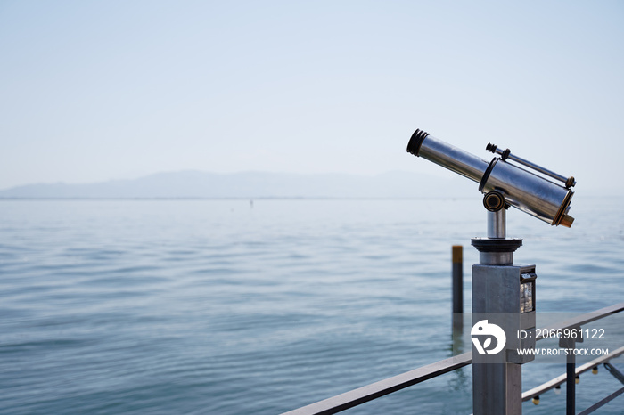 Coin Operated Spyglass viewer next to the waterside promenade looking out to the bay.